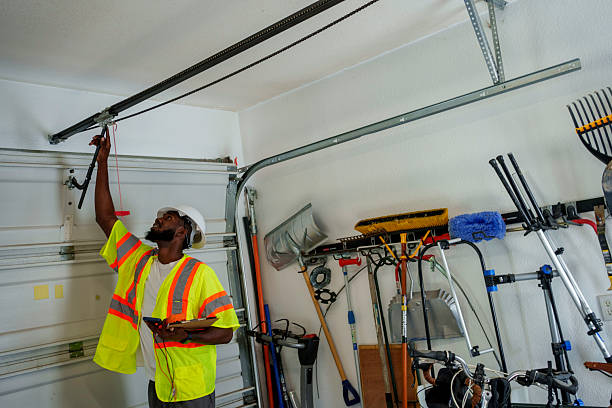 Professional Garage Door Installation technician working in Plattsburgh, NY